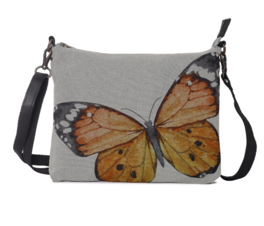 Quality cotton canvas bag with design. Monarch butterfly long removable strap. Leather trim, zipper and pockets