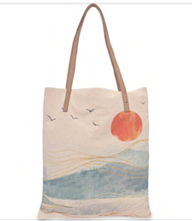 Quality cotton canvas tote bag or bookbag with beach and wave scene on one side. Leather trim, zipper and pockets Large weekender purse