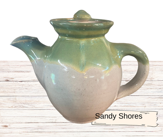 handmade teapot with pour spout for steeping and serving tea coffee milk creamer